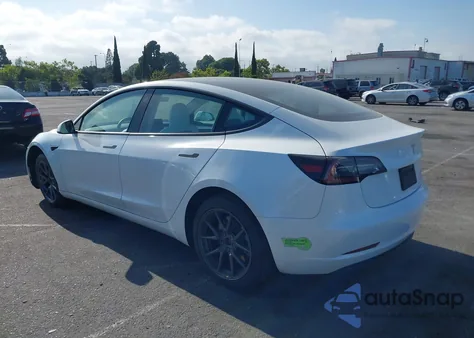 2022 Tesla Model 3 из США, поврежденный, VIN 5YJ3E1EB9NF337502